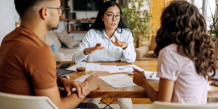 Young couple getting advice from financial expert Young couple getting advice from financial expert